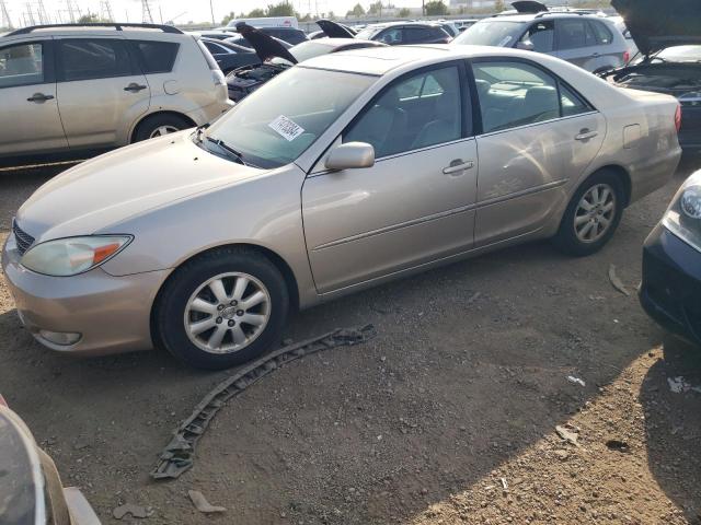TOYOTA CAMRY LE 2004 with VIN 4T1BF30K54U588241 - Photo from auction