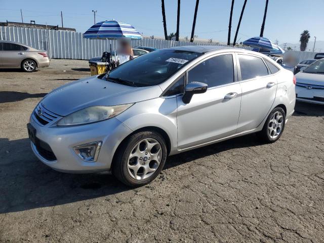 FORD FIESTA TIT 2013 with VIN 3FADP4CJ6DM213746 - Photo from auction