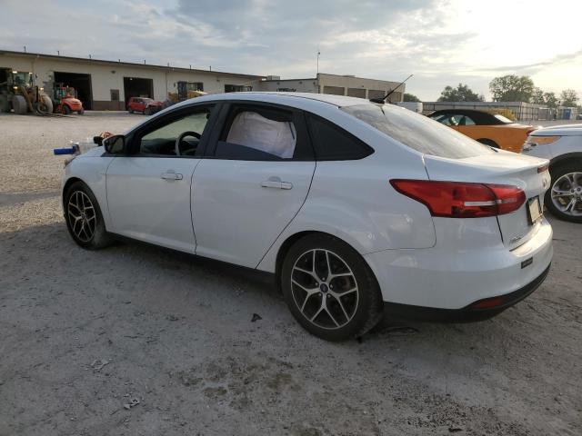 Photo 2 from auction – 2018 FORD FOCUS SE with VIN 1FADP3FE9JL286115