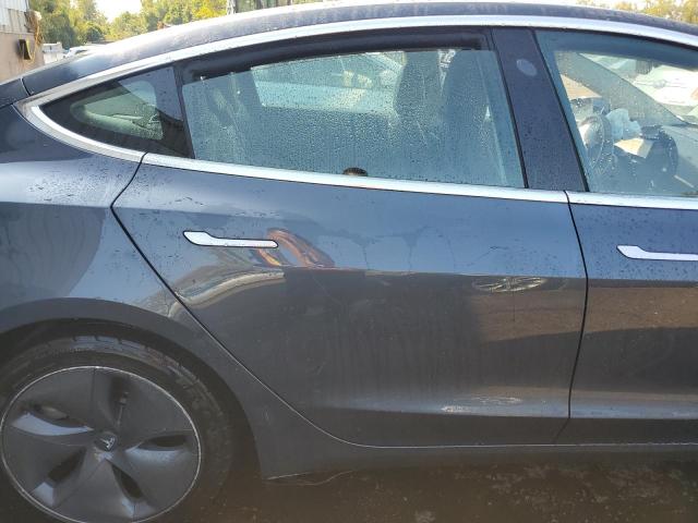 Снимка 10 от търг – 2019 TESLA MODEL 3 с VIN 5YJ3E1EBXKF520760