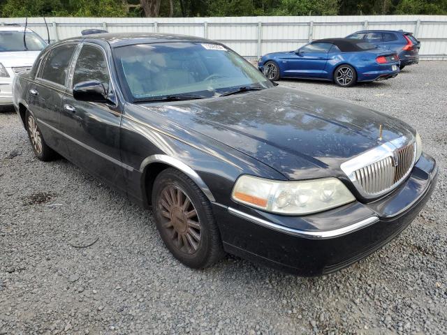 Photo 4 from auction – 2004 LINCOLN TOWN CAR E with VIN 1LNHM81W14Y660723