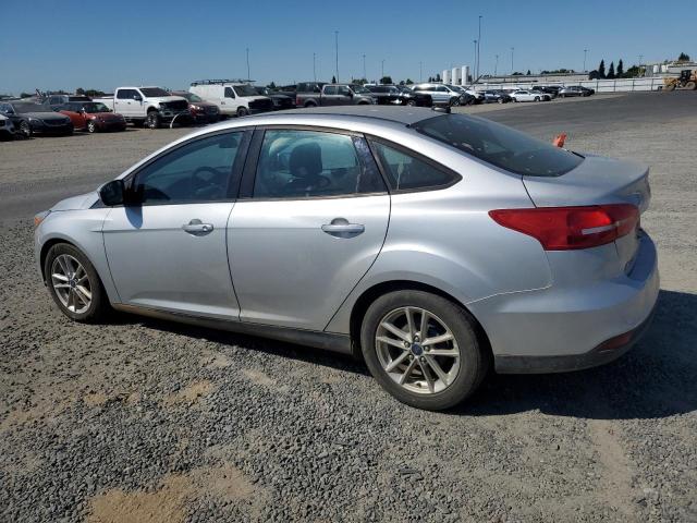 Снимка 2 от търг – 2016 FORD FOCUS SE с VIN 1FADP3F23GL264075