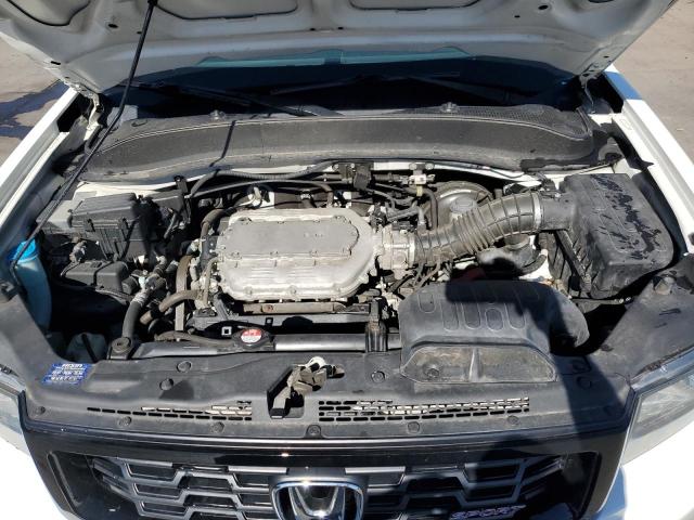 Photo 11 from auction – 2014 HONDA RIDGELINE with VIN 5FPYK1F71EB014271