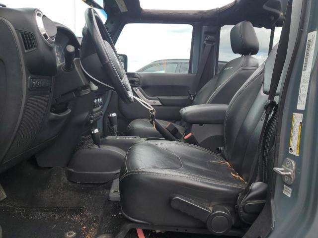 Photo 7 from auction – 2014 JEEP WRANGLER U with VIN 1C4BJWFG1EL186330