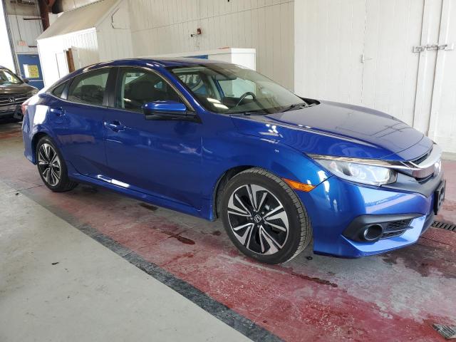 Photo 4 from auction – 2018 HONDA CIVIC EX with VIN 19XFC1F31JE201682