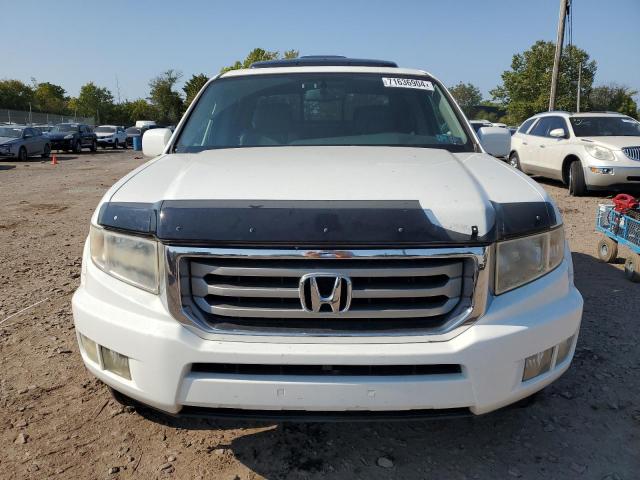 Photo 5 from auction – 2014 HONDA RIDGELINE with VIN 5FPYK1F54EB002033
