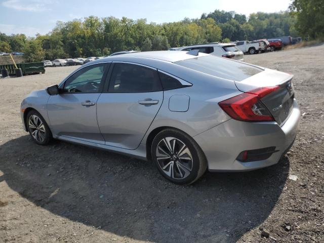 Photo 2 from auction – 2017 HONDA CIVIC EXL with VIN 2HGFC1F70HH659944
