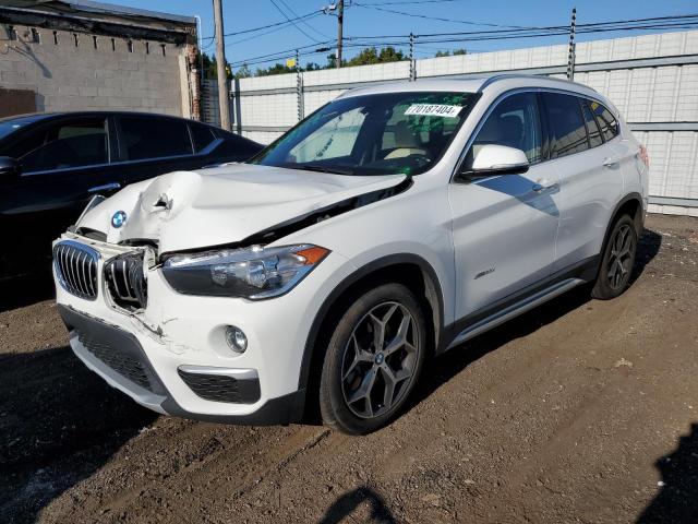 BMW X1 XDRIVE2 2018 with VIN WBXHT3C33J5K31032 - Photo from auction