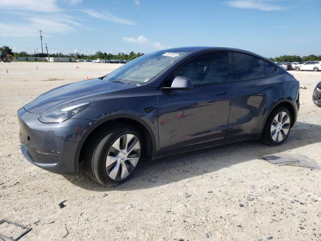 TESLA MODEL Y 2023 with VIN 7SAYGAEE3PF853662 - Photo from auction