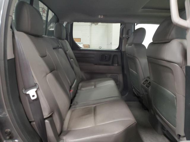 Photo 10 from auction – 2013 HONDA RIDGELINE with VIN 5FPYK1F50DB014050