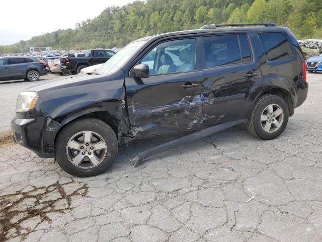 HONDA PILOT TOUR 2011 with VIN 5FNYF4H57BB027404 - Photo from auction