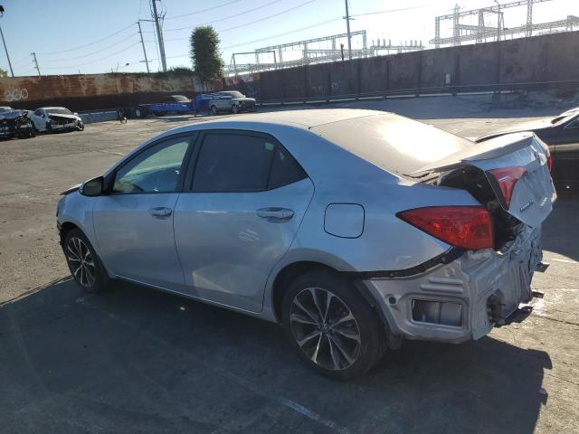 Photo 2 from auction – 2018 TOYOTA COROLLA L with VIN 5YFBURHE7JP748852