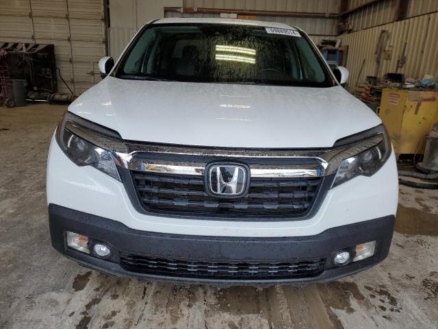 Photo 5 from auction – 2020 HONDA RIDGELINE with VIN 5FPYK3F53LB027353
