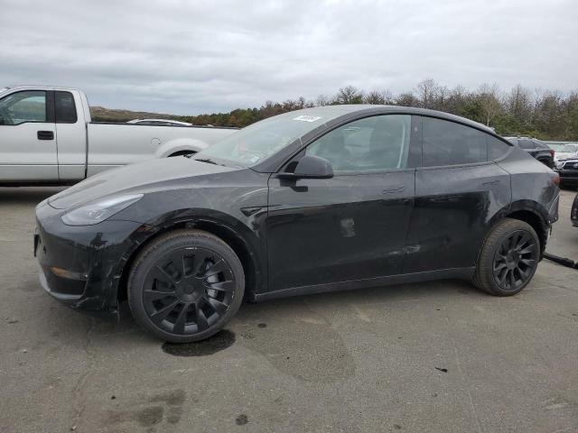 TESLA MODEL Y 2023 with VIN 7SAYGDEE2PA181415 - Photo from auction