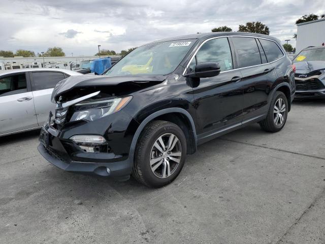 HONDA PILOT EXL 2018 with VIN 5FNYF6H55JB027833 - Photo from auction