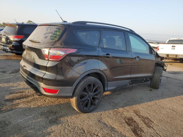 Photo 3 from auction – 2017 FORD ESCAPE SE with VIN 1FMCU9GD2HUD80862