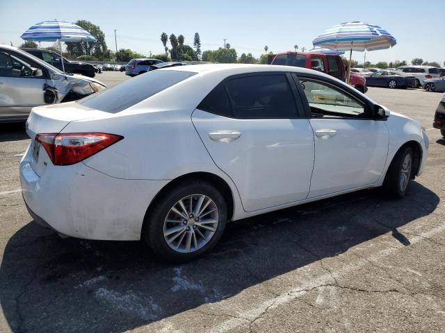 Photo 3 from auction – 2014 TOYOTA COROLLA L with VIN 5YFBURHEXEP137557