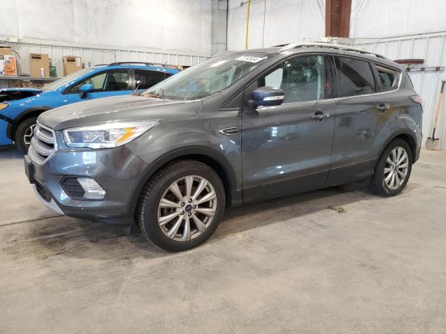 FORD ESCAPE TIT 2017 with VIN 1FMCU9J94HUA03034 - Photo from auction