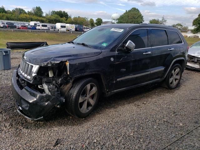 JEEP GRAND CHER 2011 with VIN 1J4RR6GT1BC640553 - Photo from auction
