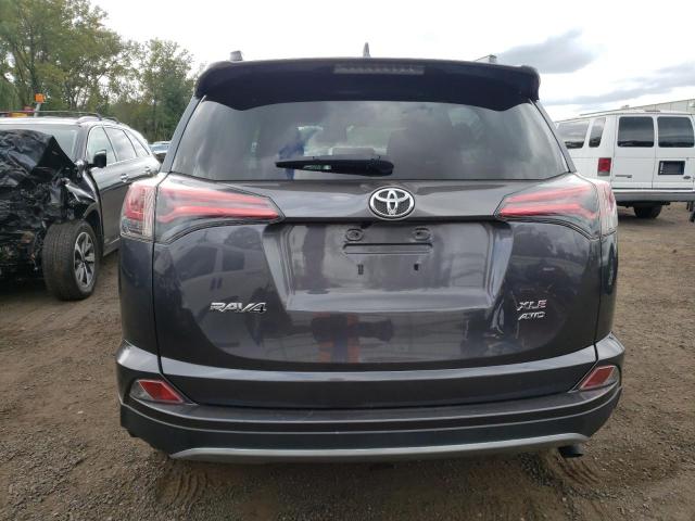 Photo 6 from auction – 2017 TOYOTA RAV4 XLE with VIN JTMRFREV7HD204068