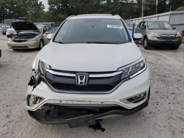 Photo 5 from auction – 2016 HONDA CR-V EXL with VIN 5J6RM4H73GL050656