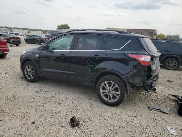 Photo 2 from auction – 2018 FORD ESCAPE SE with VIN 1FMCU0GD0JUB04553