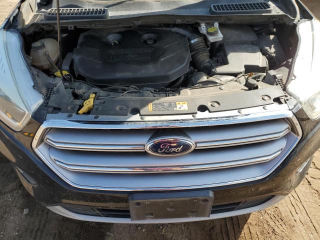 Photo 12 from auction – 2017 FORD ESCAPE SE with VIN 1FMCU9G98HUE08725
