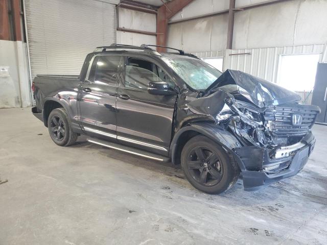 Photo 4 from auction – 2021 HONDA RIDGELINE with VIN 5FPYK3F85MB010503