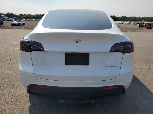 Photo 6 from auction – 2023 TESLA MODEL Y with VIN 7SAYGAEE5PF595306
