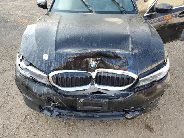 Photo 11 from auction – 2022 BMW 330XI with VIN 3MW5R7J06N8C73442