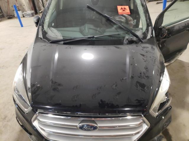 Photo 12 from auction – 2017 FORD ESCAPE TIT with VIN 1FMCU9J92HUE66905