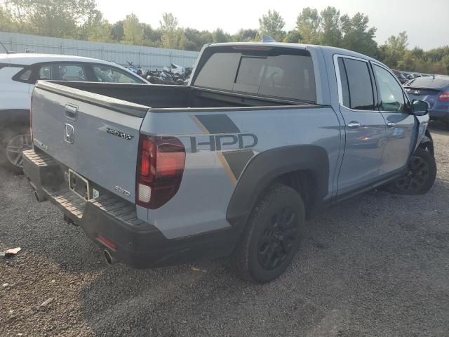 Photo 3 from auction – 2022 HONDA RIDGELINE with VIN 5FPYK3F79NB031718