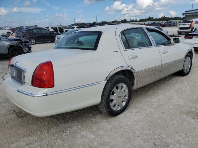 Photo 3 from auction – 2004 LINCOLN TOWN CAR U with VIN 1LNHM83W74Y640098