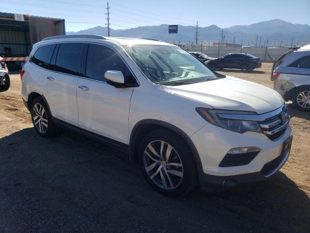 Photo 4 from auction – 2016 HONDA PILOT ELIT with VIN 5FNYF6H04GB103314