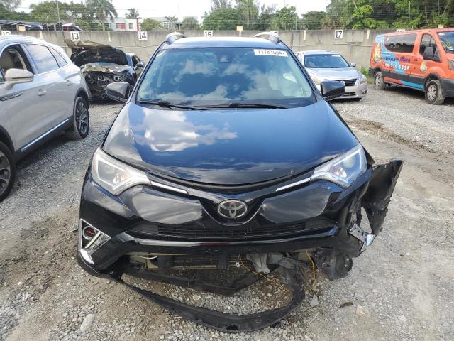 Photo 5 from auction – 2018 TOYOTA RAV4 LE with VIN 2T3ZFREV7JW469050
