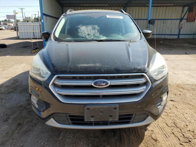 Photo 5 from auction – 2017 FORD ESCAPE SE with VIN 1FMCU9G98HUE08725