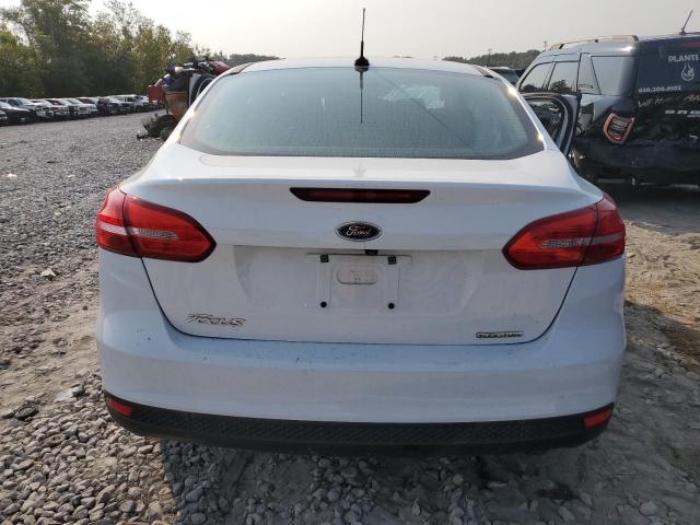 Photo 6 from auction – 2015 FORD FOCUS S with VIN 1FADP3E26FL255659