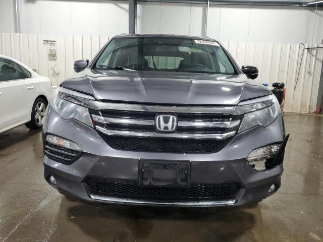 Photo 5 from auction – 2016 HONDA PILOT ELIT with VIN 5FNYF6H01GB030337