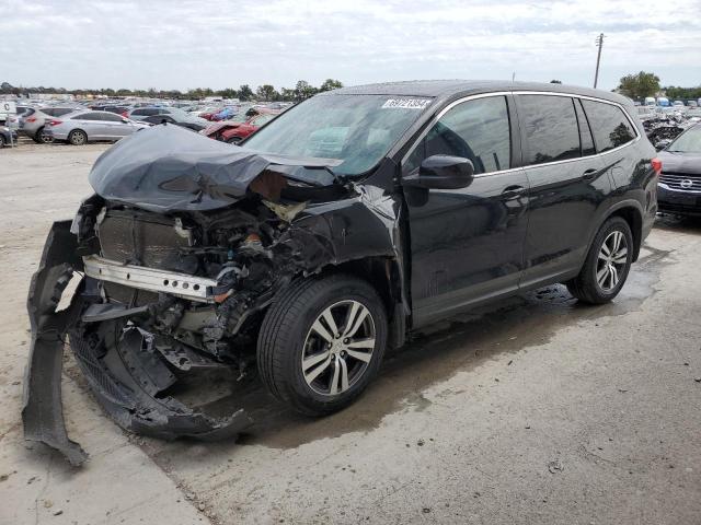 HONDA PILOT EXL 2016 with VIN 5FNYF5H56GB043431 - Photo from auction