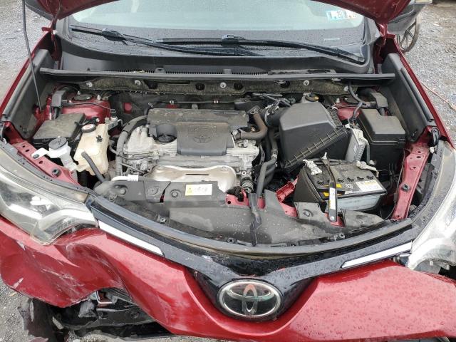 Photo 12 from auction – 2018 TOYOTA RAV4 LE with VIN JTMBFREV2JD227717