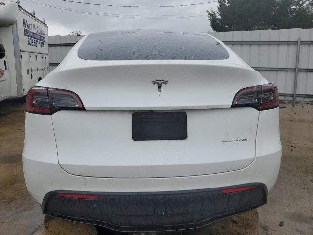 Photo 6 from auction – 2023 TESLA MODEL Y with VIN 7SAYGDEE8PF761724