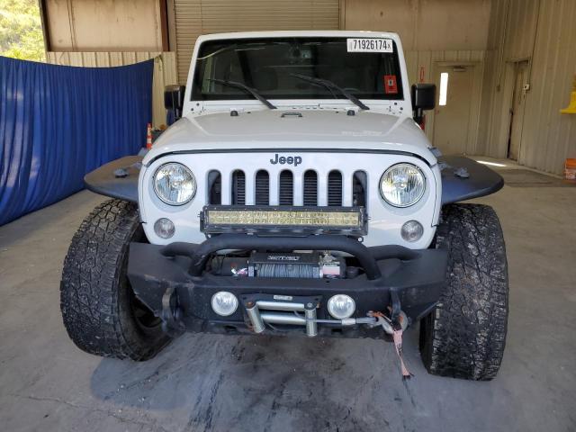 Photo 5 from auction – 2015 JEEP WRANGLER U with VIN 1C4HJWDGXFL520059