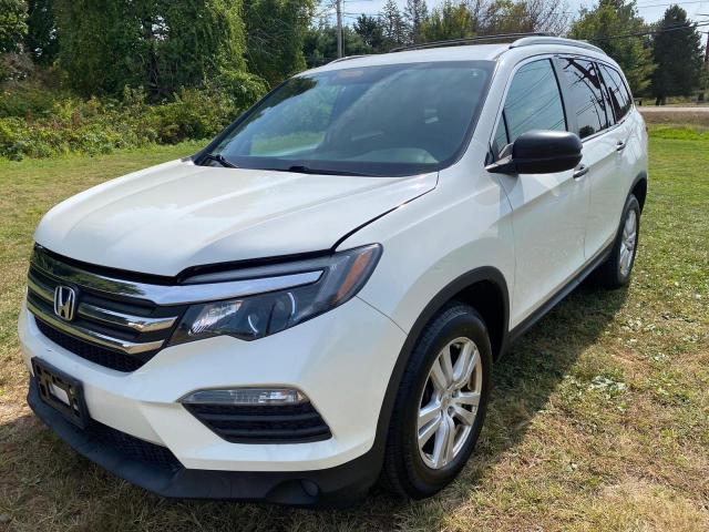 Photo 2 from auction – 2016 HONDA PILOT LX with VIN 5FNYF6H18GB023040