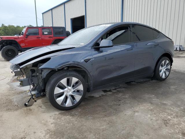 TESLA MODEL Y 2023 with VIN 7SAYGDEE1PA037239 - Photo from auction