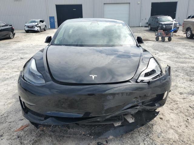 Photo 5 from auction – 2021 TESLA MODEL 3 with VIN 5YJ3E1EA9MF911649