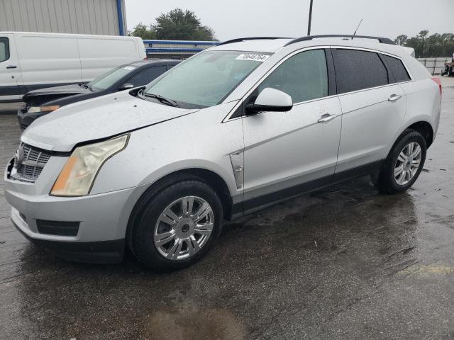 CADILLAC SRX 2012 with VIN 3GYFNGE35CS536439 - Photo from auction