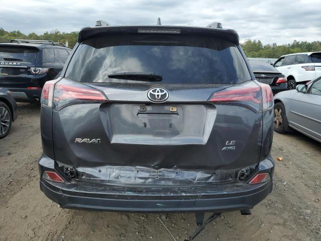 Photo 6 from auction – 2018 TOYOTA RAV4 LE with VIN JTMBFREV2JJ232286