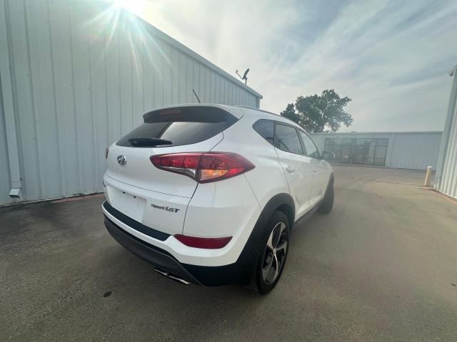 Photo 4 from auction – 2016 HYUNDAI TUCSON LIM with VIN KM8J33A27GU192349