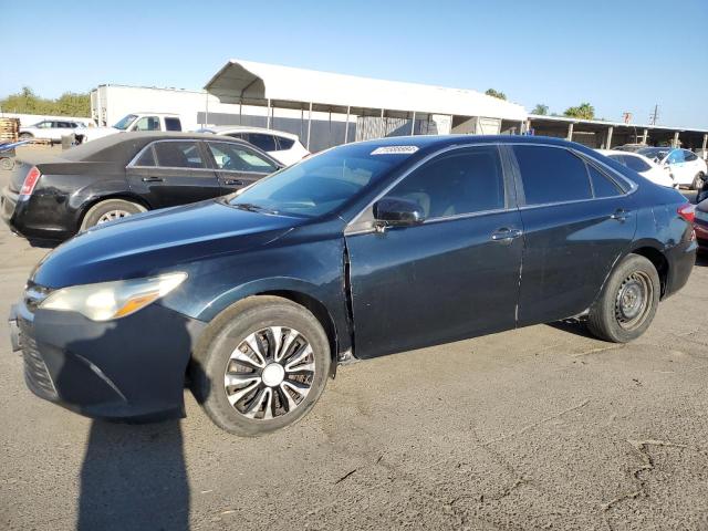 TOYOTA CAMRY LE 2015 with VIN 4T4BF1FK4FR487860 - Photo from auction