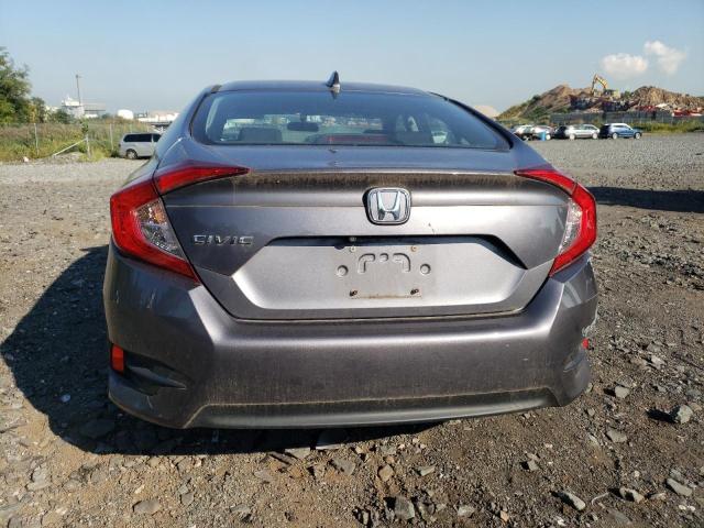 Photo 6 from auction – 2018 HONDA CIVIC EX with VIN 2HGFC2F74JH577100